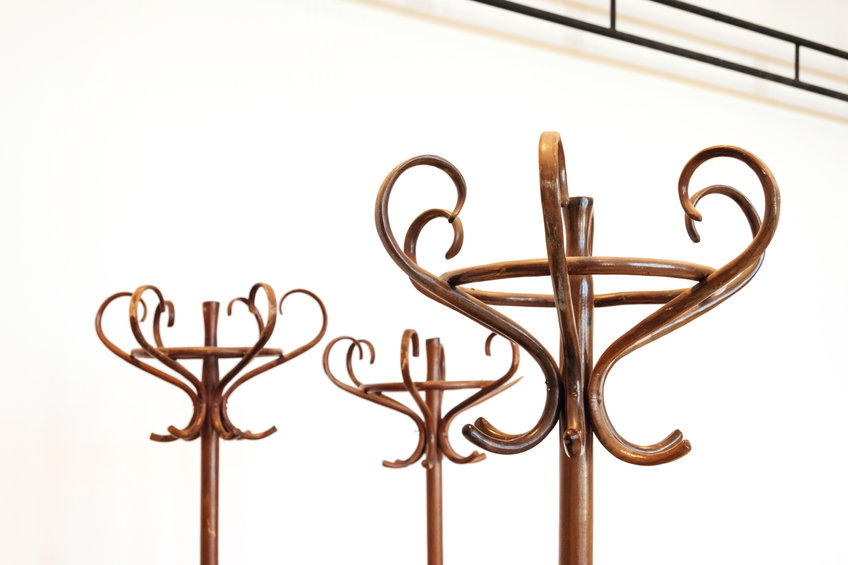 detail of vintage wooden brown coat racks